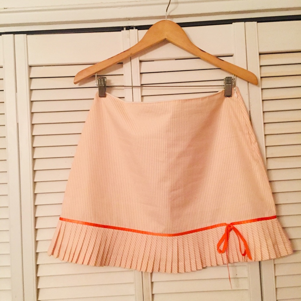 Mini orange and white skirts